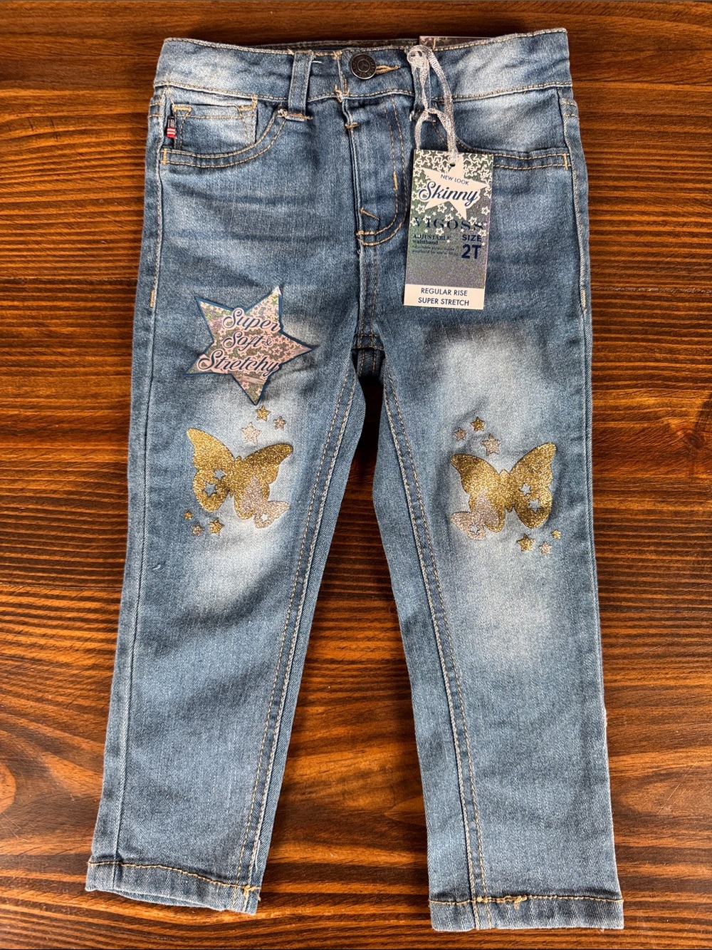 Vigoss Light Blue Skinny Jeans with Gold Butterfly Accents